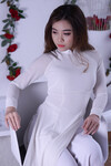 Em mẫu ruột nude cùng bộ trang phục áo dài